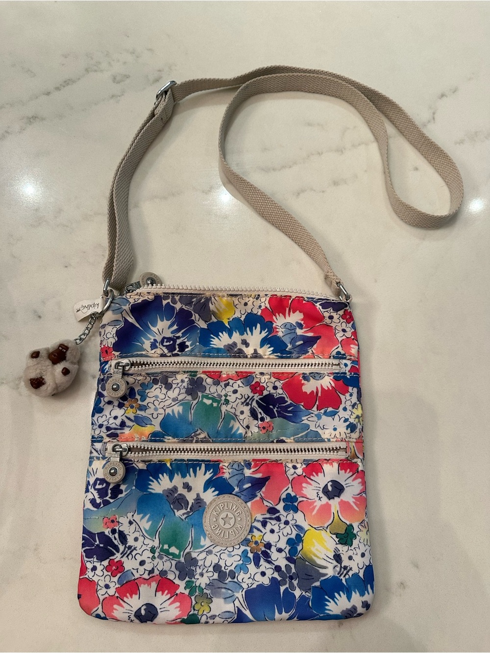 Kipling Floral Crossbody Bag in Blue, Pink, Red, Yellow